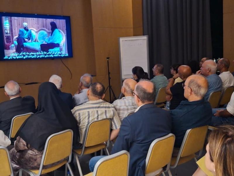 Audience watching The Hardest Bridge with Arabic subtitles in Beirut